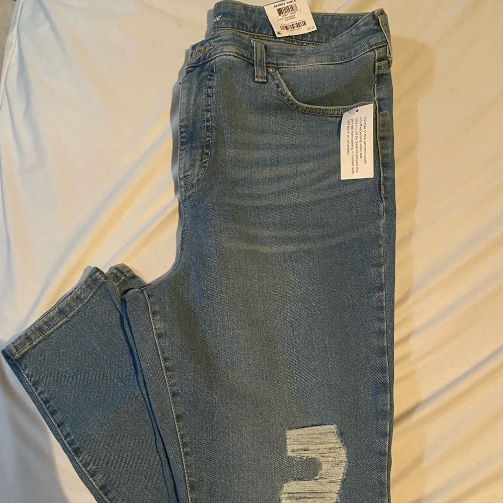 Skinny high rise ripped jeans